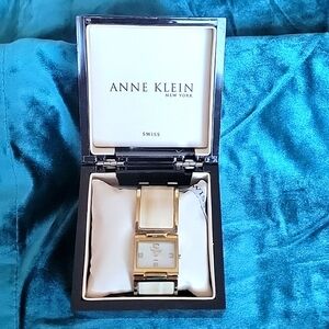 Anne Klein 12/2030IMHN Gold-Tone Mother of Pearl Dial Sea Shell Women's Watch